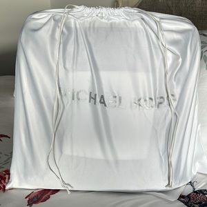 Michael Kors white dust bag.